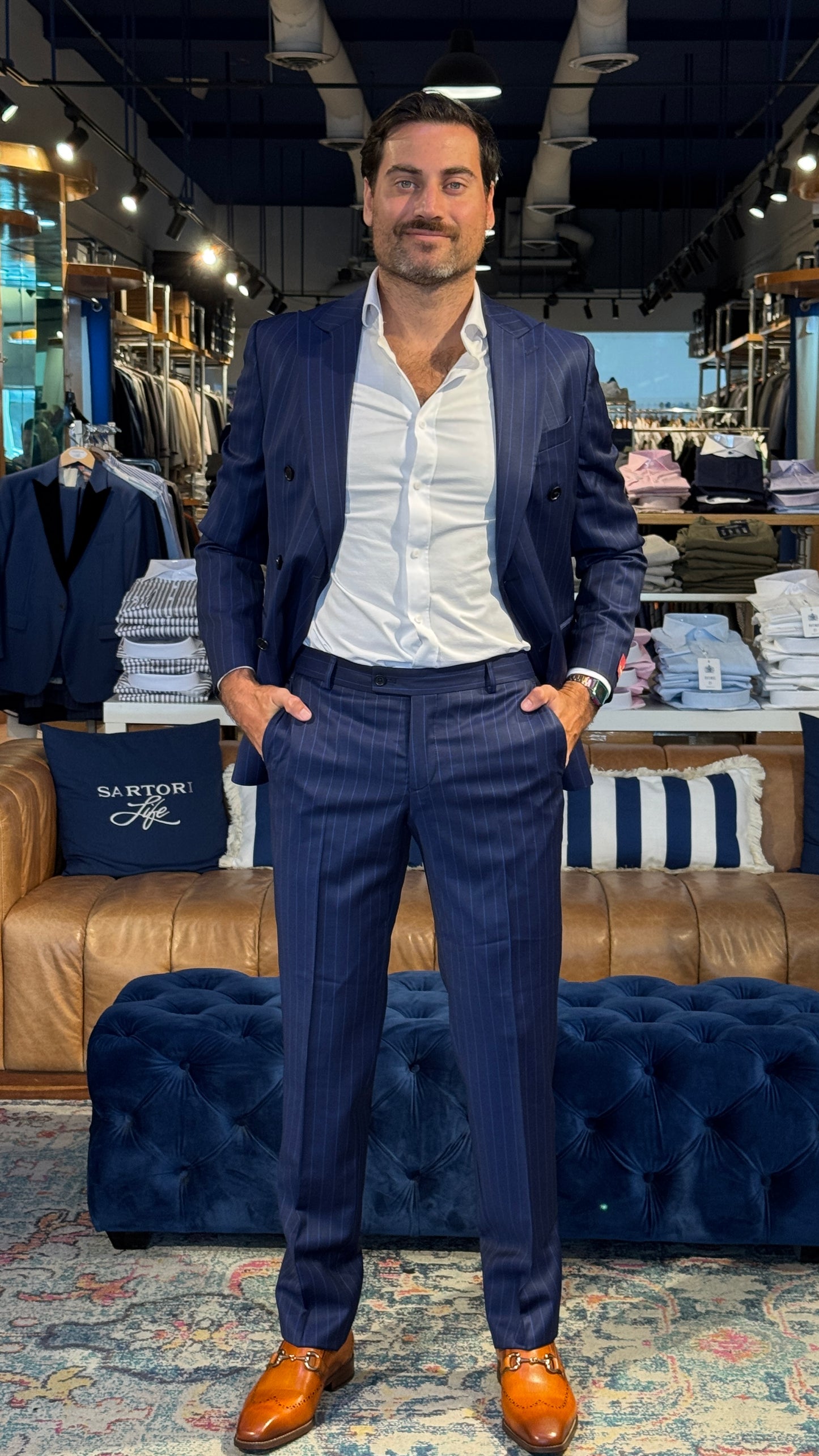 Classic Elegance with a Modern Twist: Double Breasted Suit with White Pinstripes