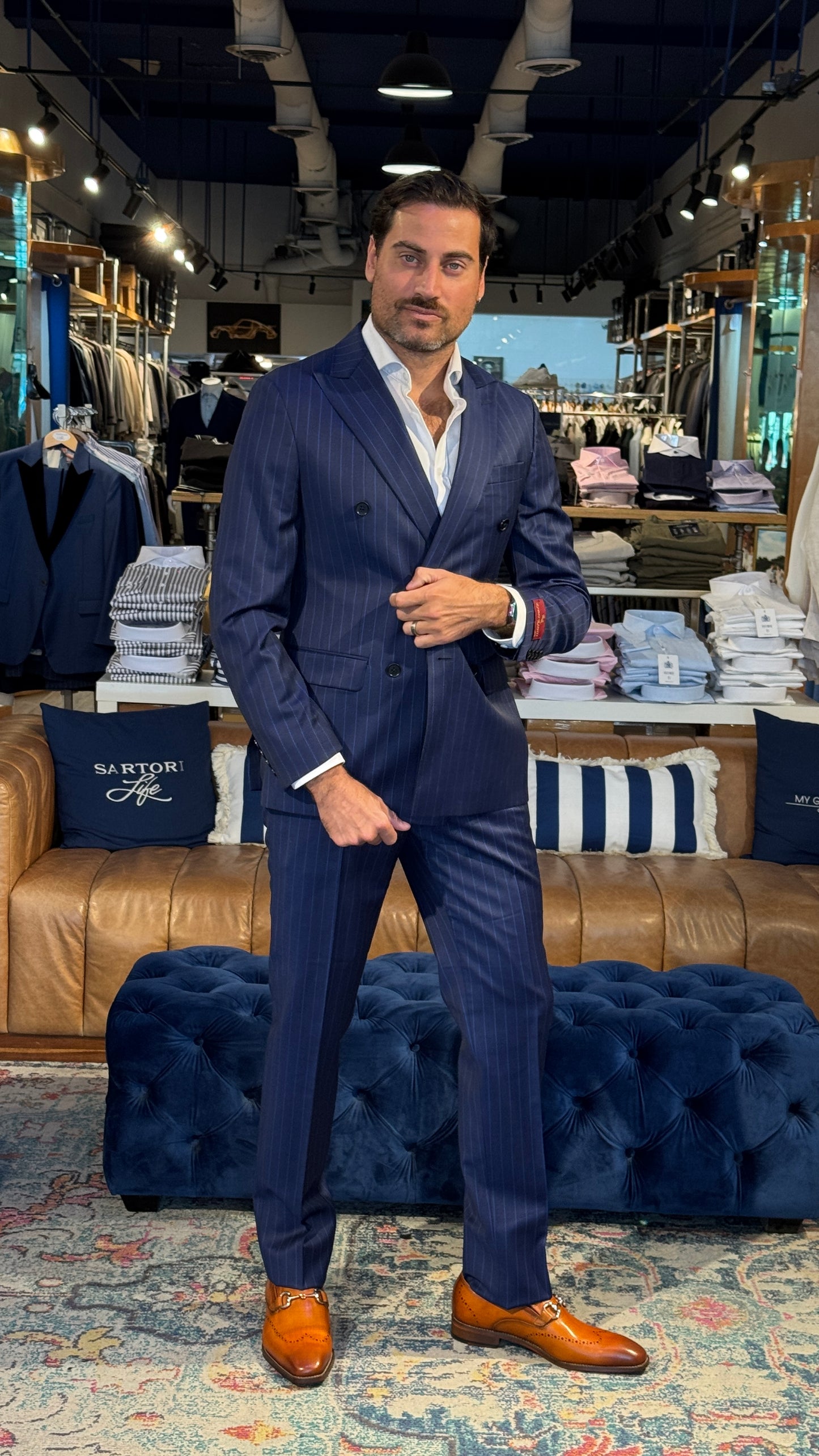 Classic Elegance with a Modern Twist: Double Breasted Suit with White Pinstripes
