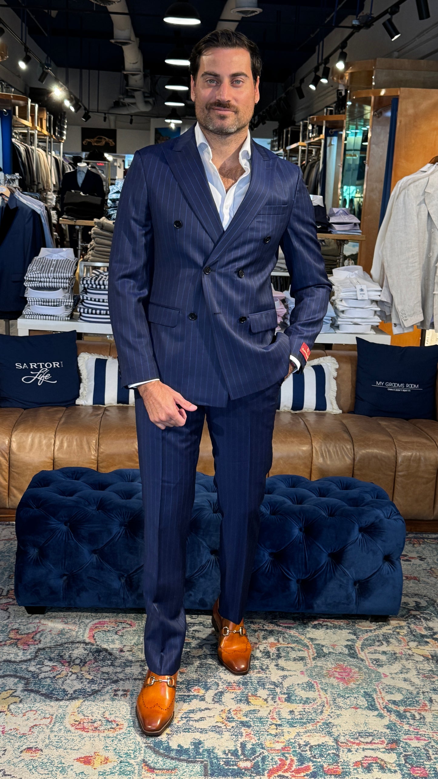 Classic Elegance with a Modern Twist: Double Breasted Suit with White Pinstripes